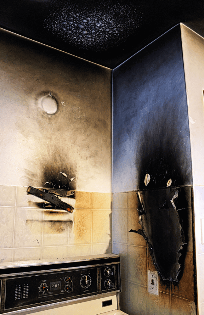 An image of a fire-damaged walls in the kitchen